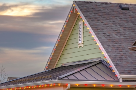 christmas lights on the outside of green house